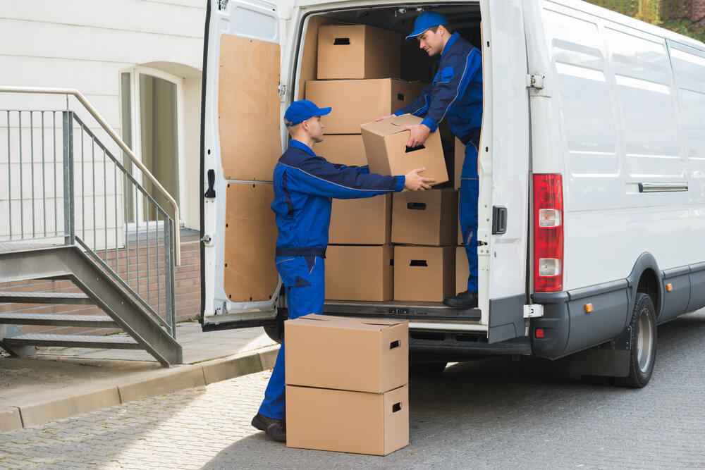 Professional Movers Loading Furniture In Fulshear